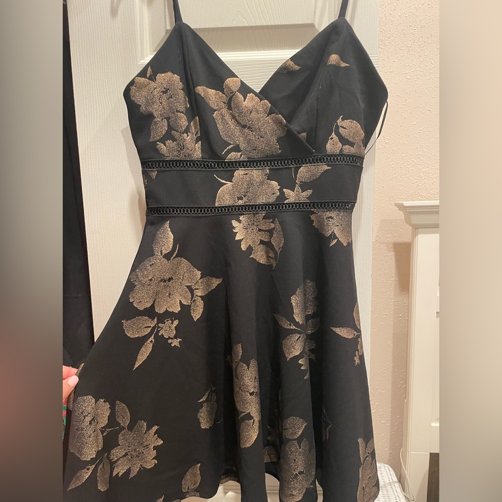 Franchesicas black and gold dress